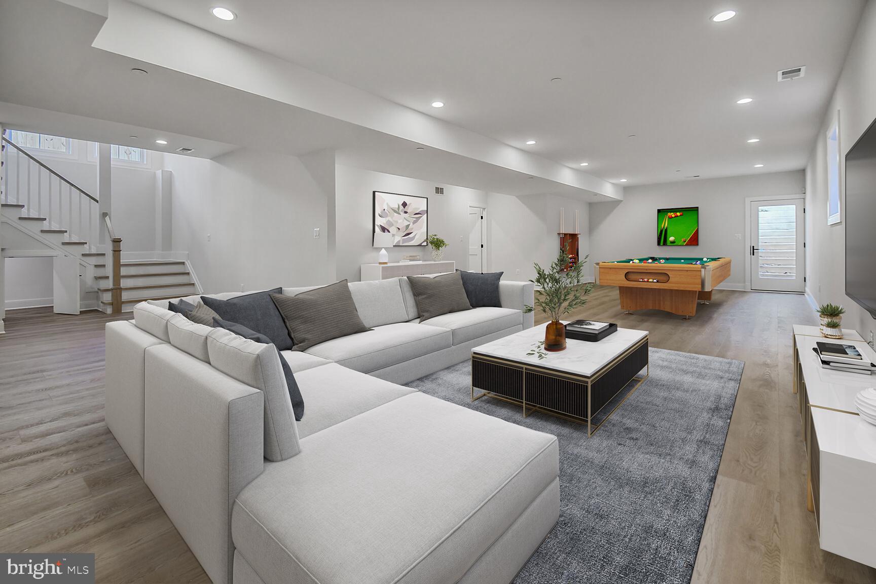 7819 Exeter Road Bethesda, MD 20814 - Photo 37 of 44 a living room with furniture and a table