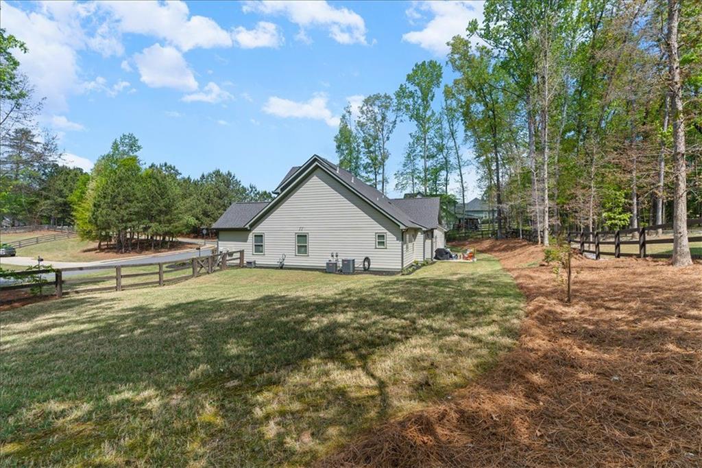 7610 Scenic Overlook Cumming, GA 30041 - Photo 44 of 62 a view of a house with a yard