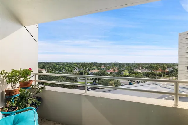 a view of balcony with a roof deck