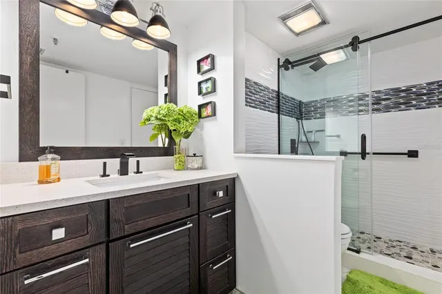 a bedroom with a bed and furniture