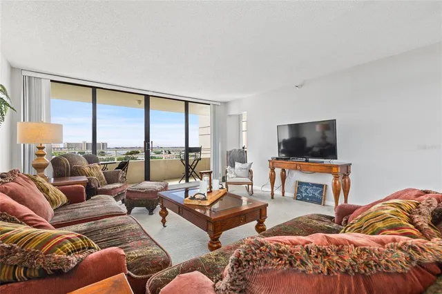 a kitchen with a stove a sink and a microwave