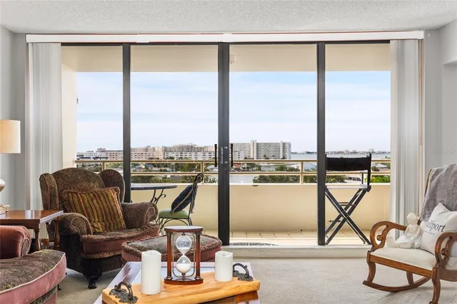a kitchen with a sink a stove a refrigerator and cabinets