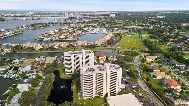 an aerial view of a city with lake view