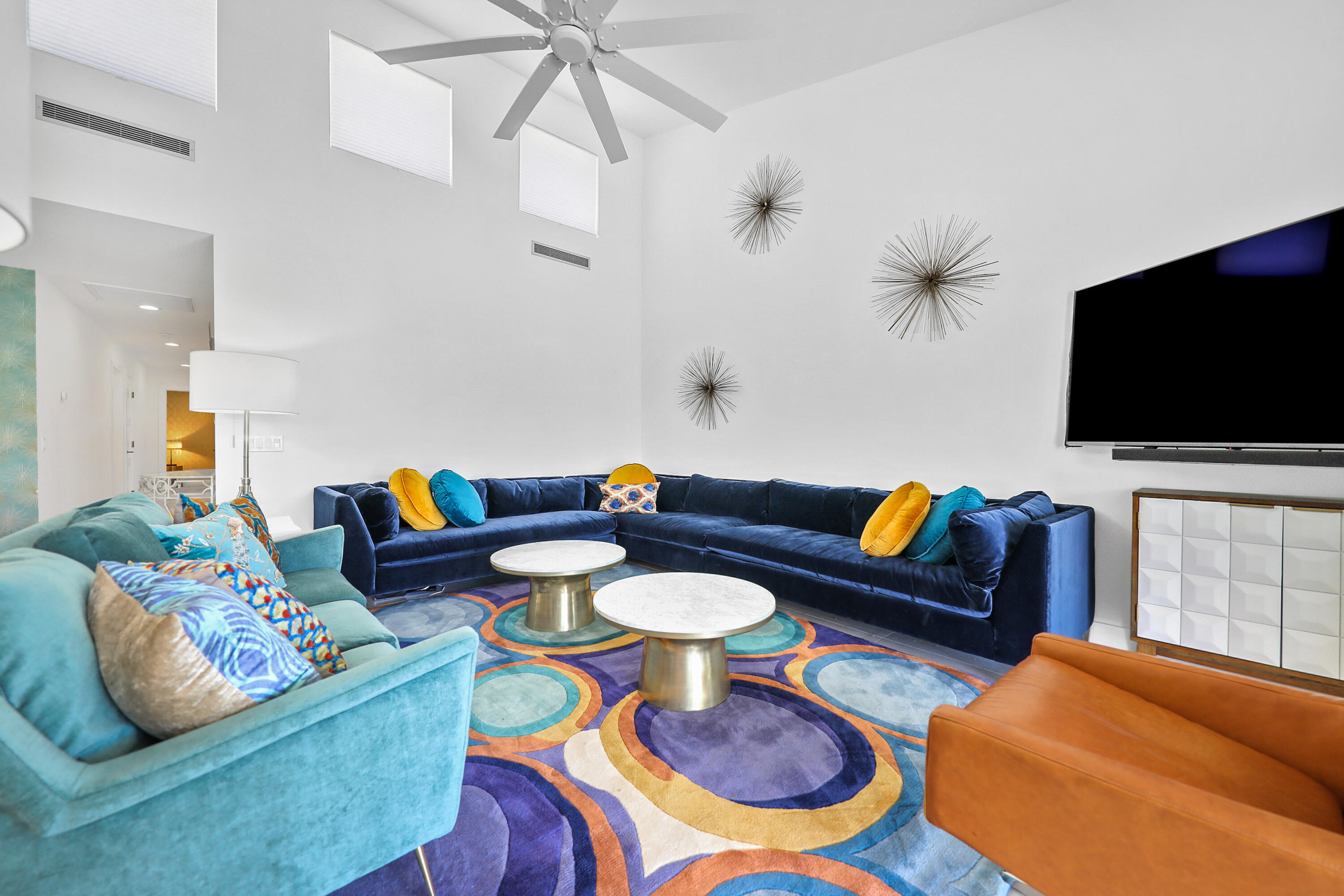 24 Leon Way Rancho Mirage, CA 92270 - Photo 1 of 30 a living room with furniture and a flat screen tv