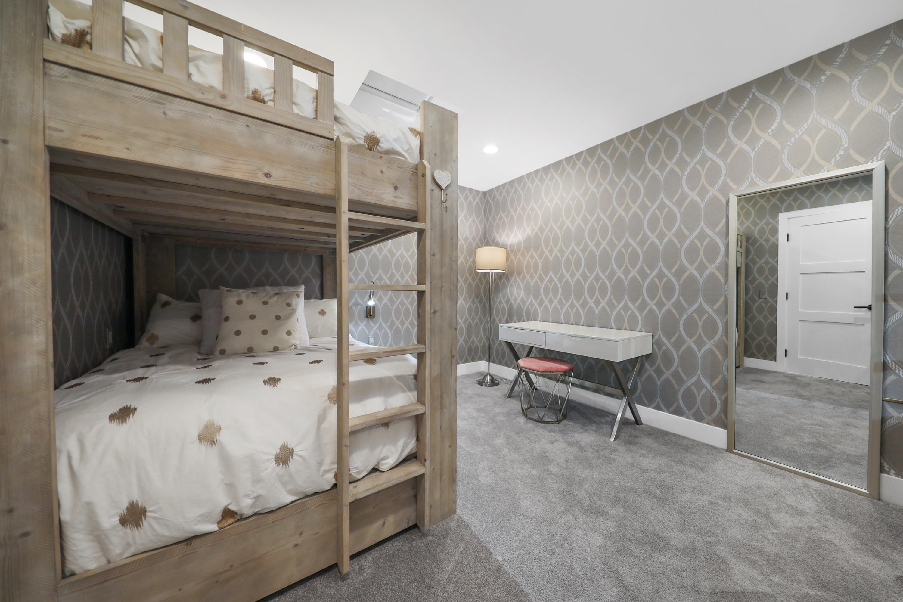 24 Leon Way Rancho Mirage, CA 92270 - Photo 12 of 30 a bedroom with a bed and a cabinets