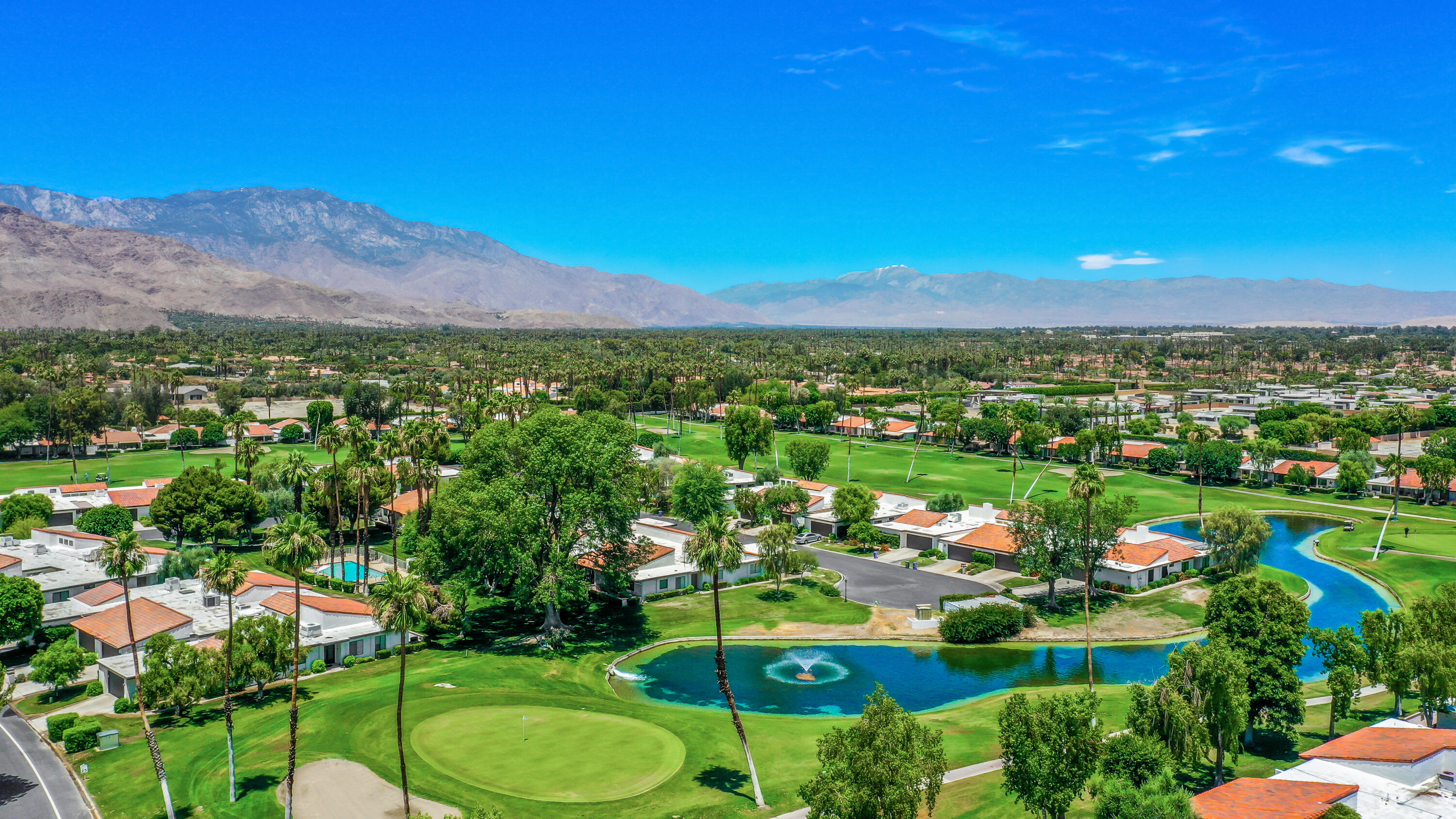 24 Leon Way Rancho Mirage, CA 92270 - Photo 29 of 30 a view of a city with a lake