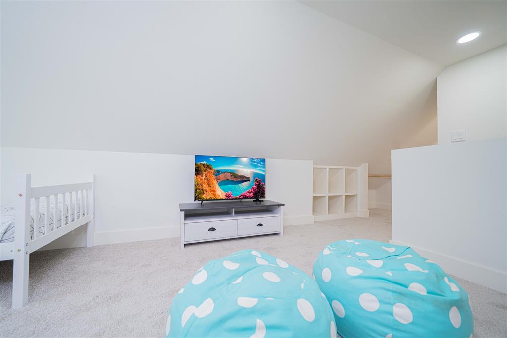 646 North Private Road Leesburg, TX 75451 - Photo 31 of 40 a living room with furniture and a flat screen tv