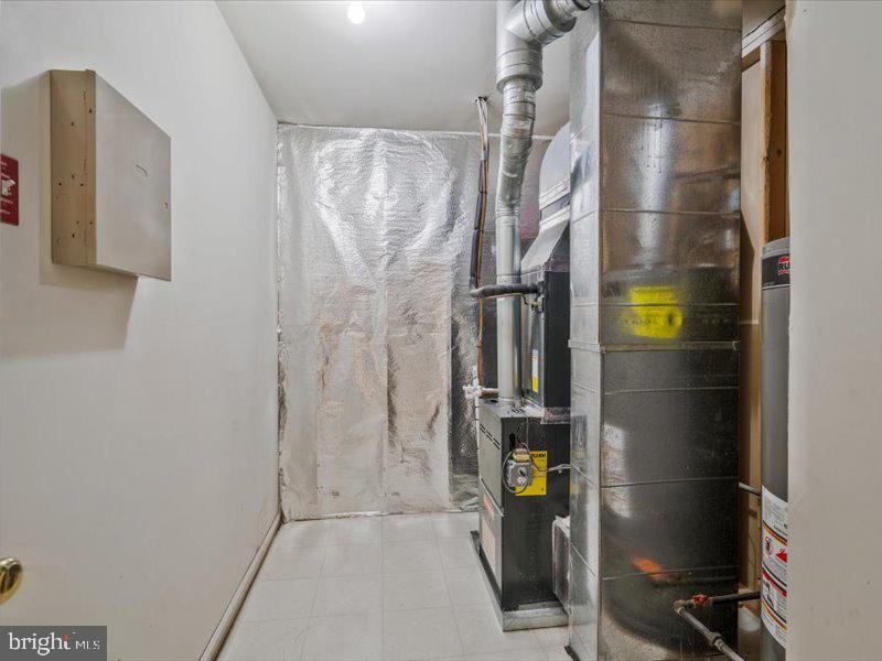 14240 Foxhall Road, Unit 15 Solomons, MD 20629 - Photo 3 of 7 a close view of walk in closet