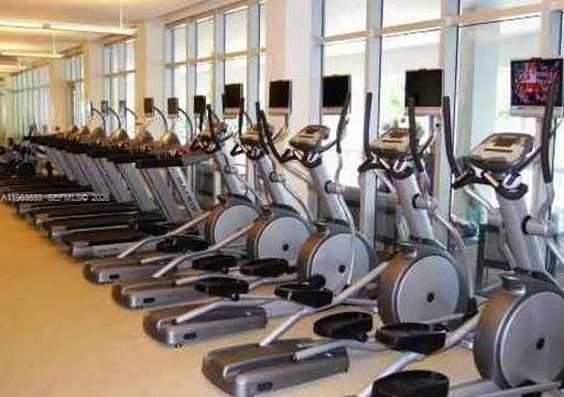 10275 Collins Avenue, Unit 427 Bal Harbour, FL 33154 - Photo 17 of 21 a view of a room with gym equipment