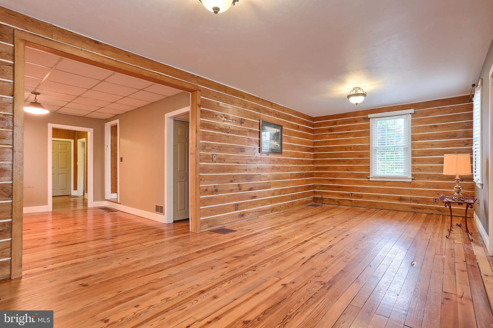 321 Union Road Lebanon, PA 17046 - Photo 7 of 50 Living Room featuring exposed wood walls
