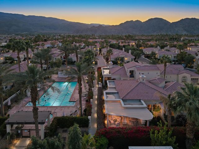 an aerial view of residential houses and trees