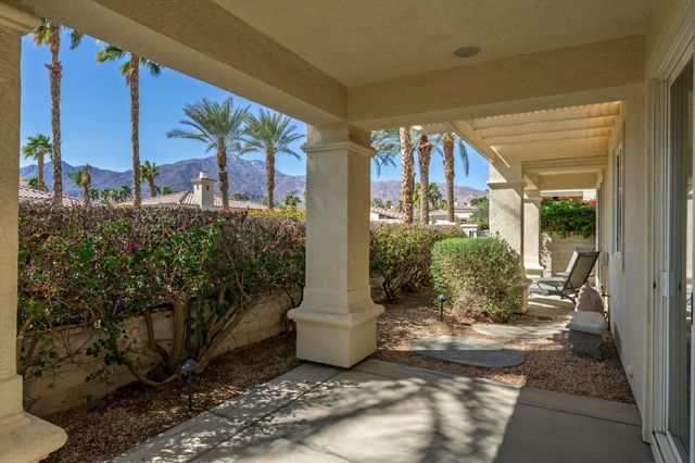 a view of a building with porch and outdoor space