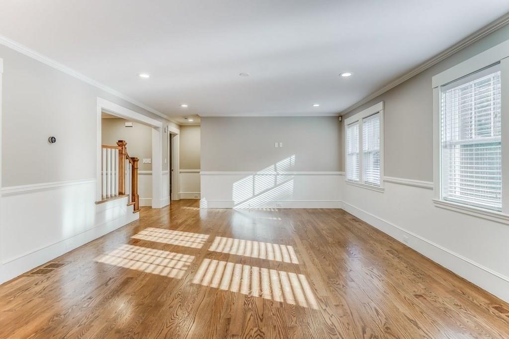 28 Fells Road Winchester, MA 01890 - Photo 15 of 42 a view of empty room with wooden floor and fan