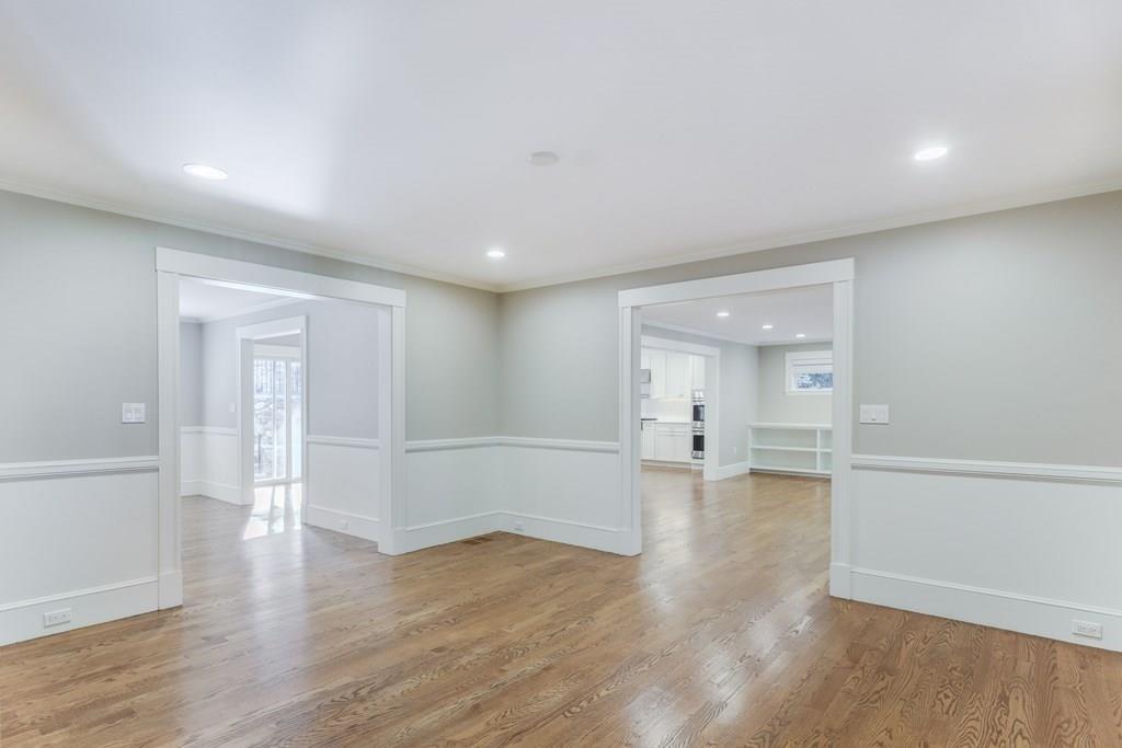 28 Fells Road Winchester, MA 01890 - Photo 17 of 42 wooden floor in an empty room with a window
