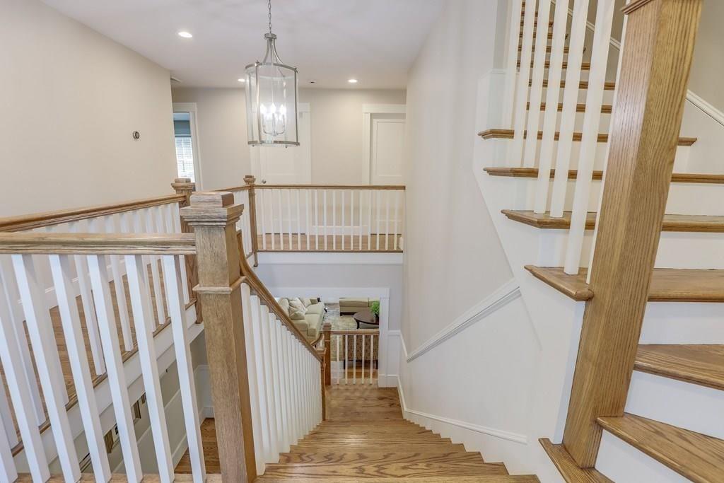 28 Fells Road Winchester, MA 01890 - Photo 19 of 42 a view of staircase with railing and white walls