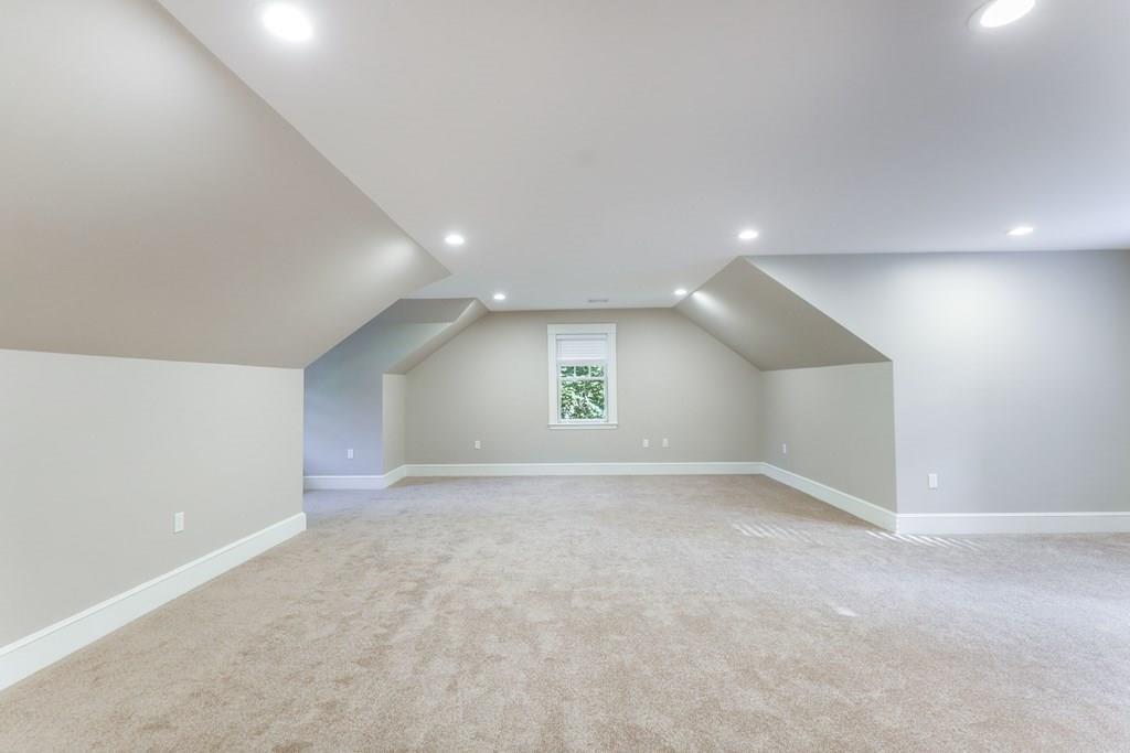 28 Fells Road Winchester, MA 01890 - Photo 31 of 42 an empty room with a empty space and windows