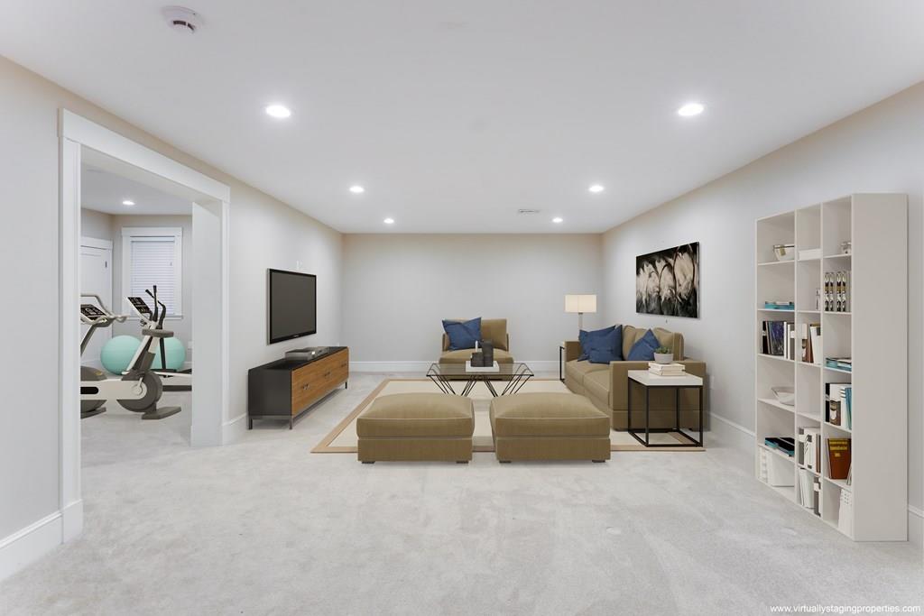 28 Fells Road Winchester, MA 01890 - Photo 34 of 42 a living room with furniture and a flat screen tv