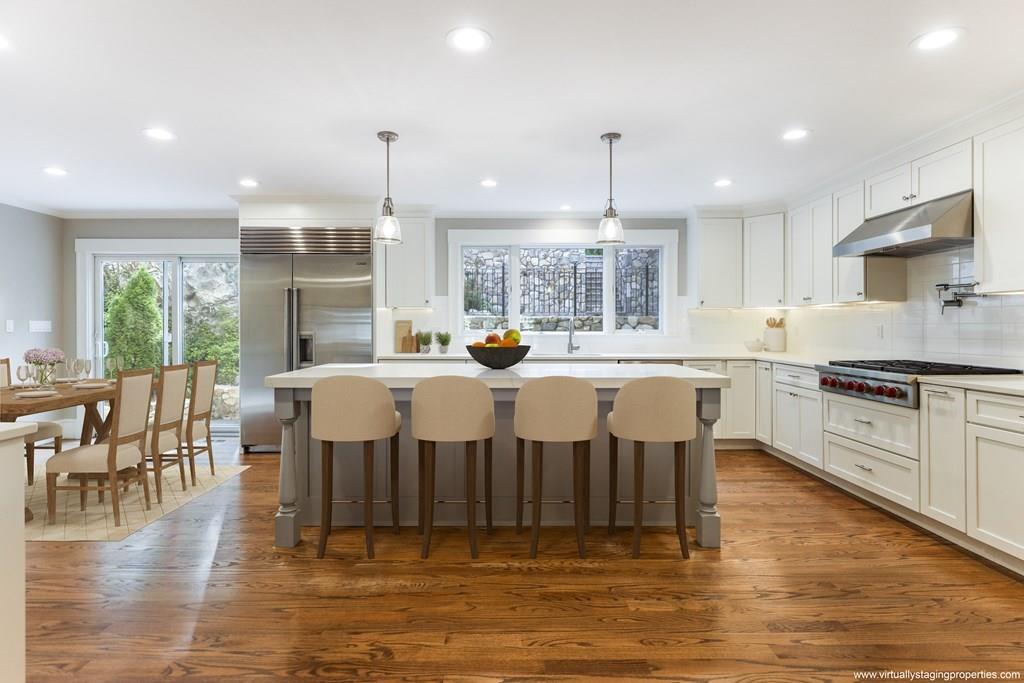 28 Fells Road Winchester, MA 01890 - Photo 7 of 42 a large kitchen with a table and chairs