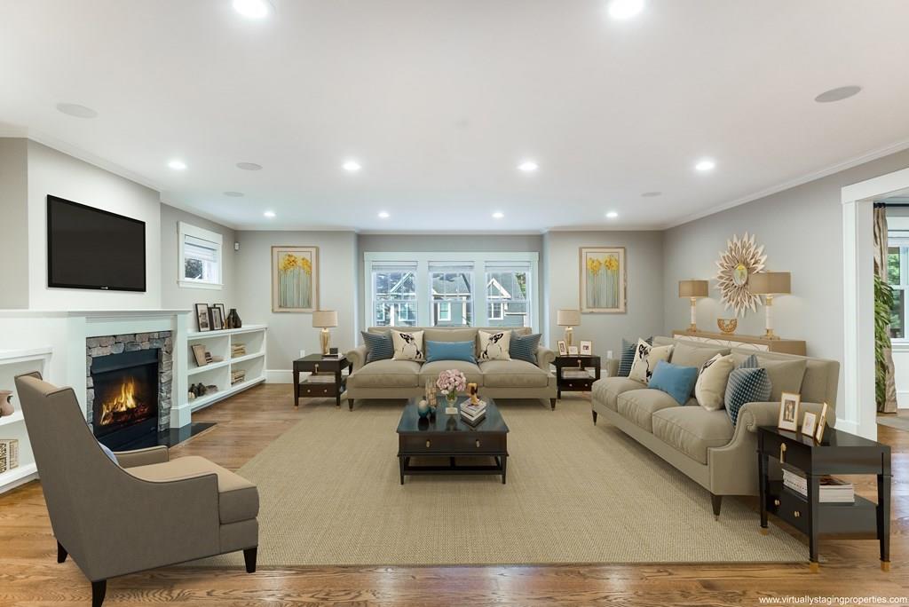 28 Fells Road Winchester, MA 01890 - Photo 10 of 42 a living room with fireplace furniture and a flat screen tv