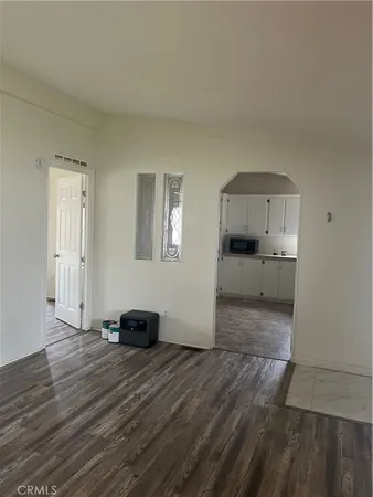 a kitchen with cabinets and stainless steel appliances