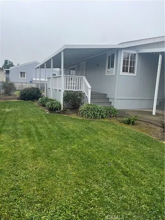 a view of a back yard of the house