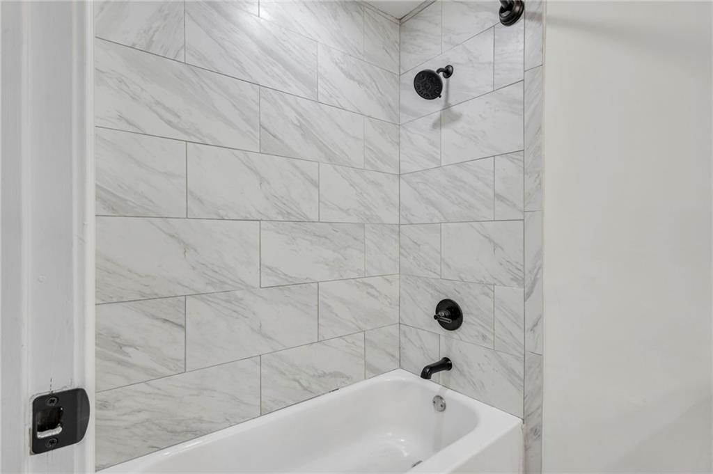3531 Tulip Drive Decatur, GA 30032 - Photo 36 of 48 a bathroom with a tub
