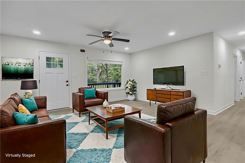 3531 Tulip Drive Decatur, GA 30032 - Photo 6 of 48 a living room with furniture and a flat screen tv
