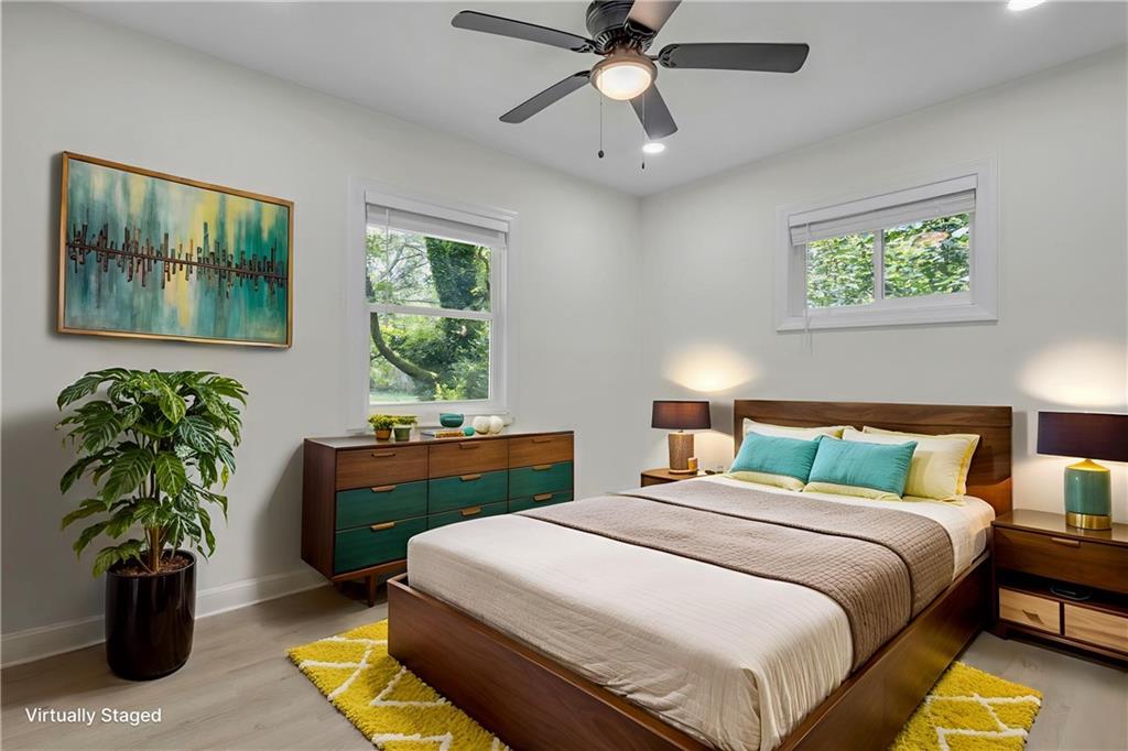 3531 Tulip Drive Decatur, GA 30032 - Photo 10 of 48 a bedroom with a bed table and a window