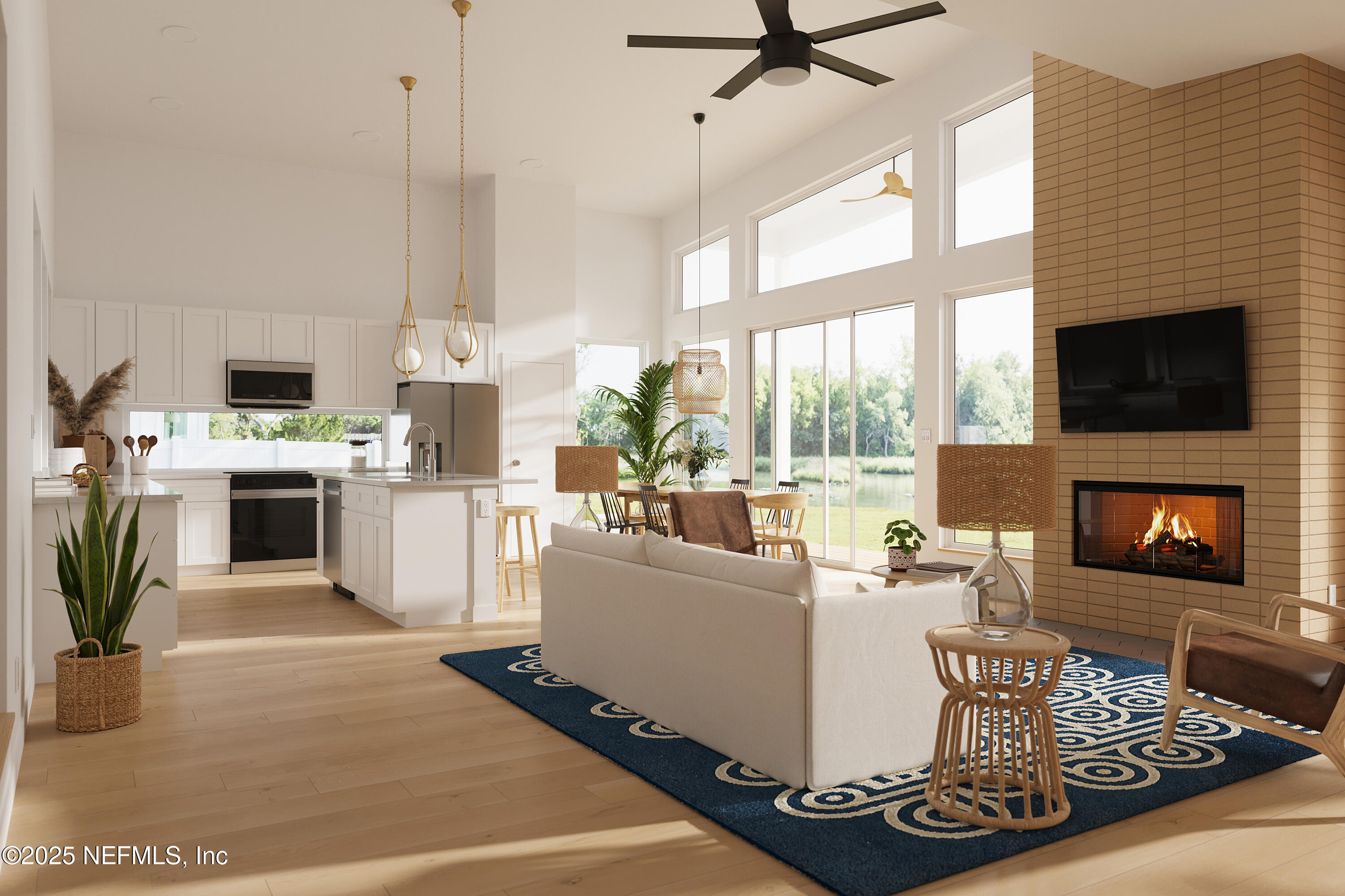 22 Poinciana Cove Road St. Augustine, FL 32084 - Photo 14 of 20 a living room with furniture a fireplace and a flat screen tv