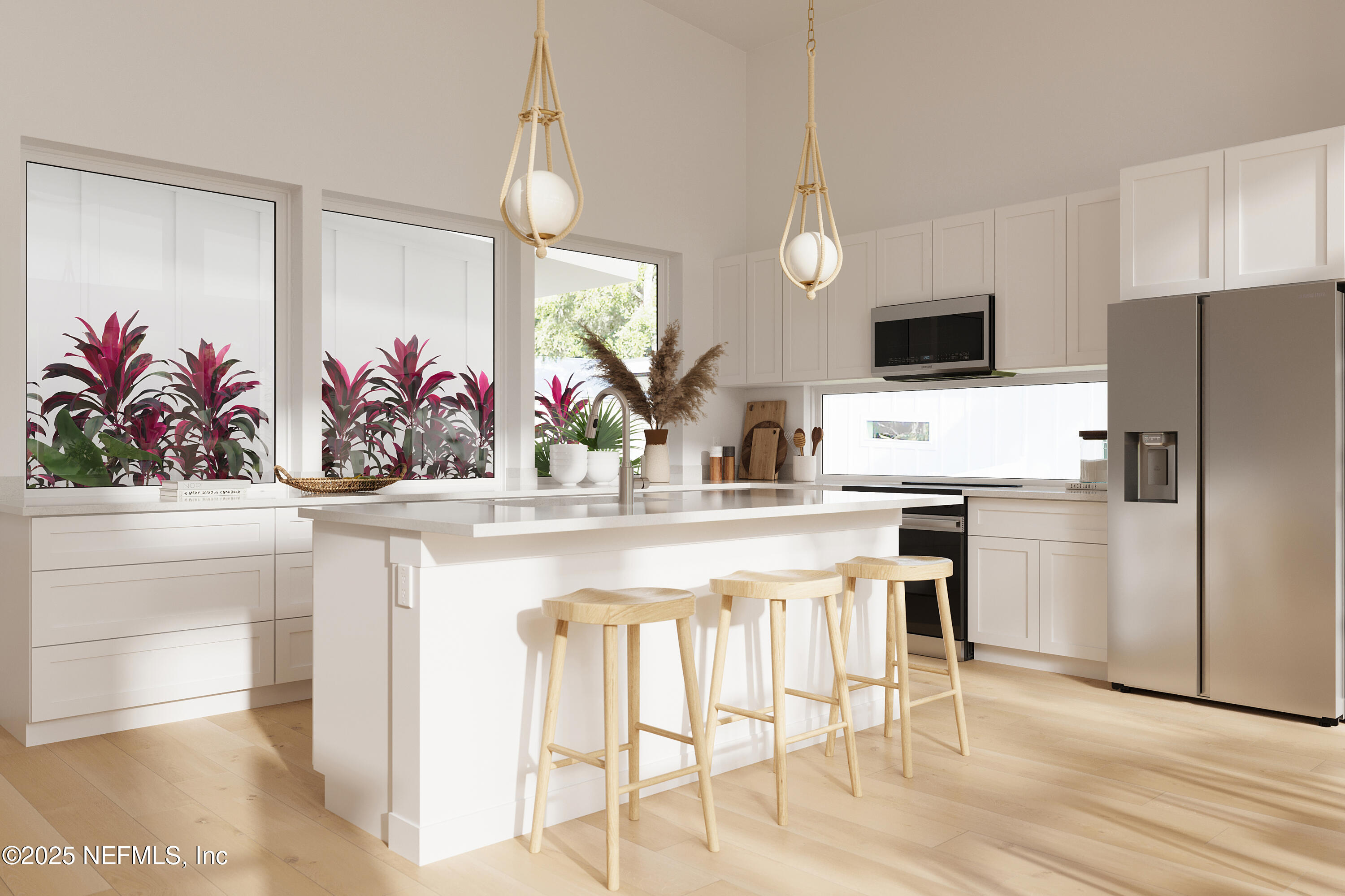 22 Poinciana Cove Road St. Augustine, FL 32084 - Photo 17 of 20 a kitchen with white cabinets and stainless steel appliances