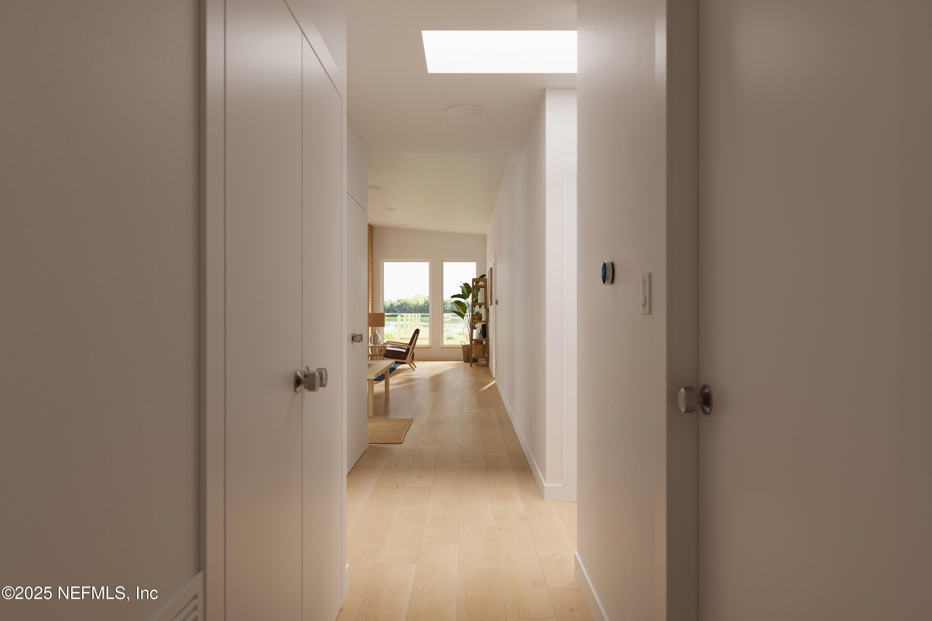 22 Poinciana Cove Road St. Augustine, FL 32084 - Photo 19 of 20 a view of a hallway with wooden floor and a living room