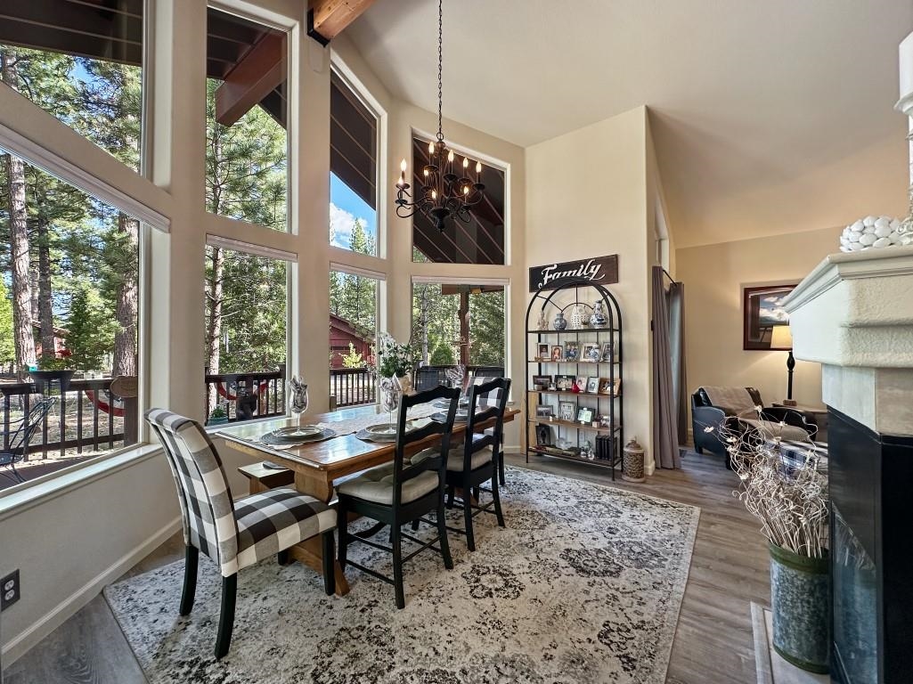 27 One Horse Way Clio, CA 96106 - Photo 11 of 38 a view of a dining room with furniture window and outside view