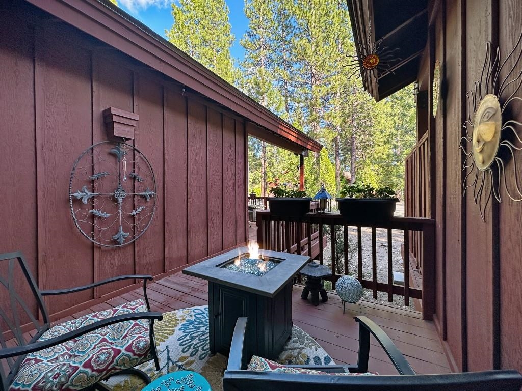 27 One Horse Way Clio, CA 96106 - Photo 18 of 38 a view of a balcony with chairs