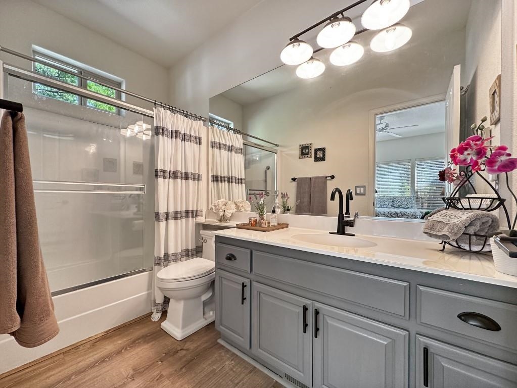 27 One Horse Way Clio, CA 96106 - Photo 26 of 38 a bathroom with a sink a toilet and shower