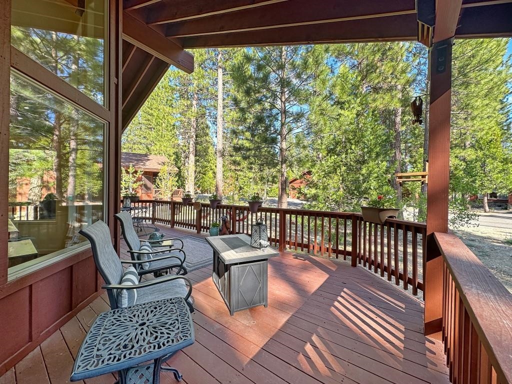 27 One Horse Way Clio, CA 96106 - Photo 3 of 38 a view of a chairs and table in the balcony