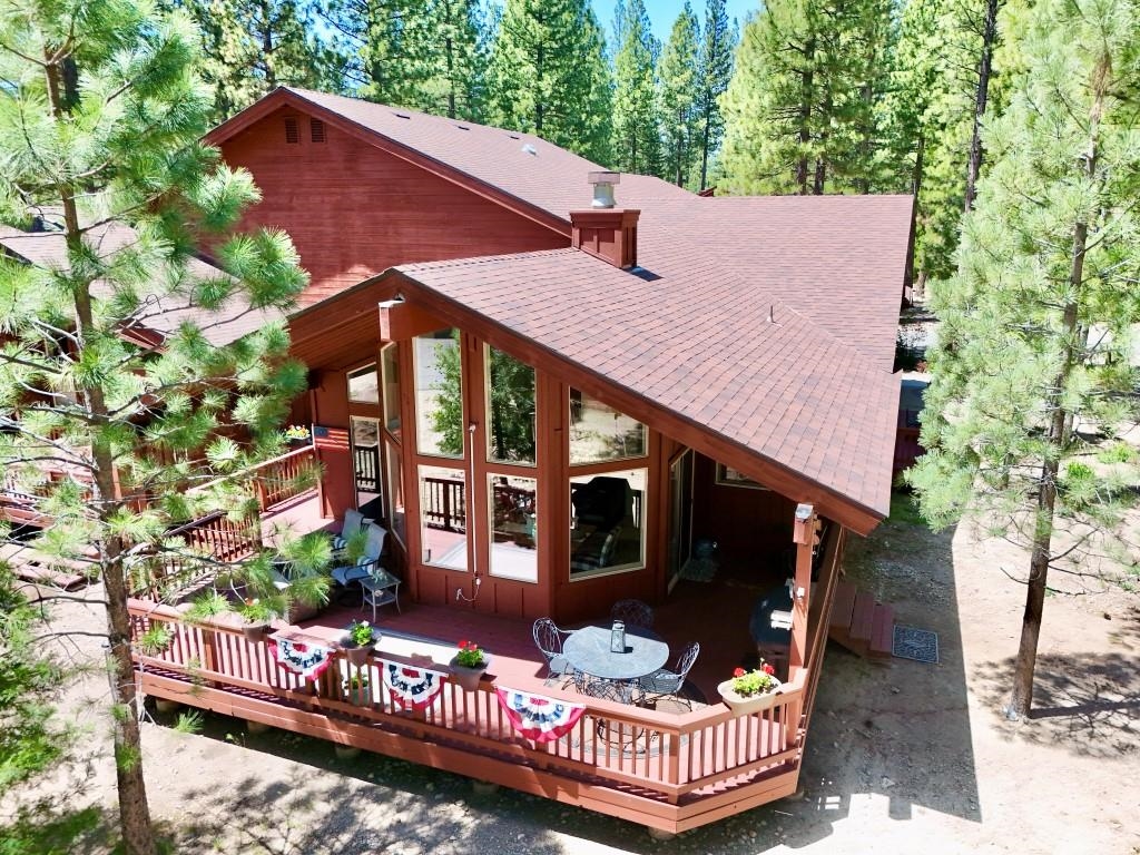 27 One Horse Way Clio, CA 96106 - Photo 31 of 38 a front view of a house with a garden