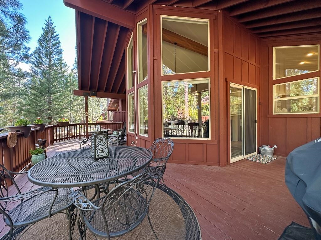 27 One Horse Way Clio, CA 96106 - Photo 4 of 38 a dinning table and chairs in a patio