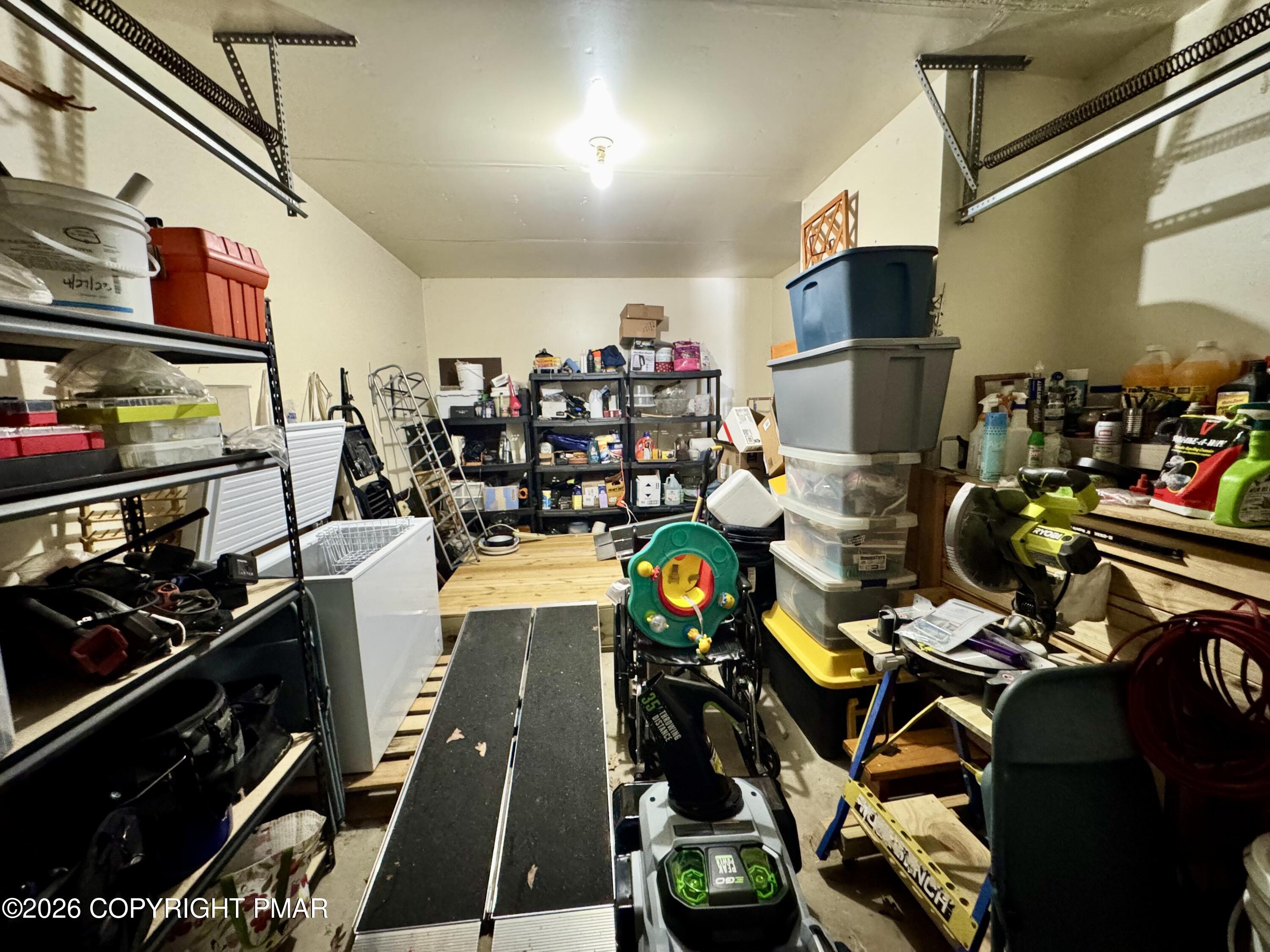 217 Bindale Road Tamiment, PA 18371 - Photo 20 of 27 a room with lots of storage and utility