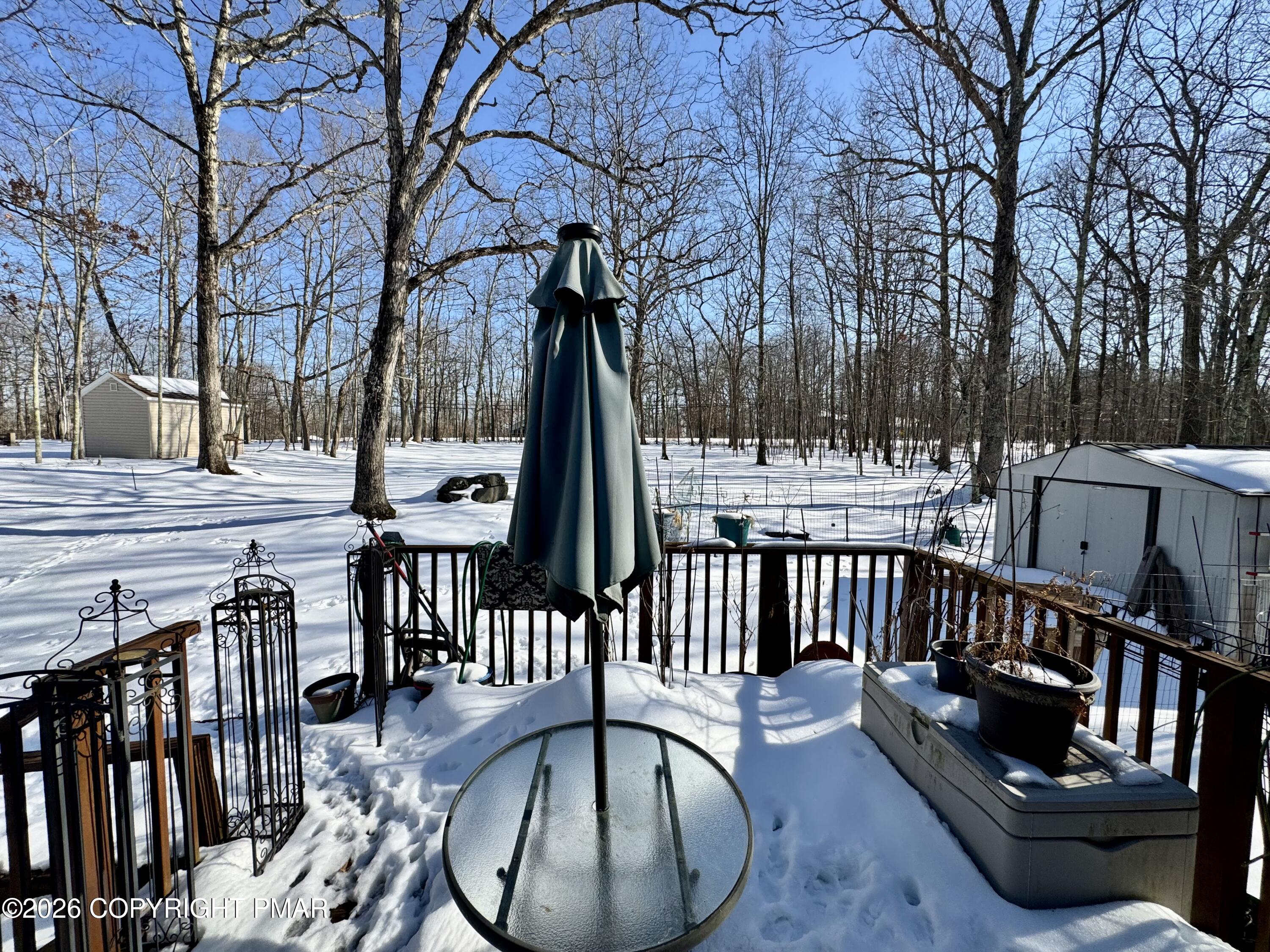 217 Bindale Road Tamiment, PA 18371 - Photo 25 of 27 a view of a chairs and tables in the balcony