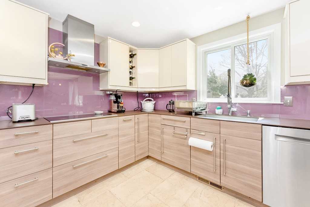 37 River Ridge Wellesley, MA 02481 - Photo 12 of 33 a kitchen with cabinets appliances and a window