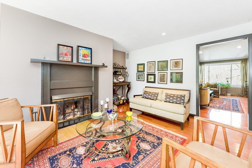37 River Ridge Wellesley, MA 02481 - Photo 14 of 33 a living room with furniture and a fireplace