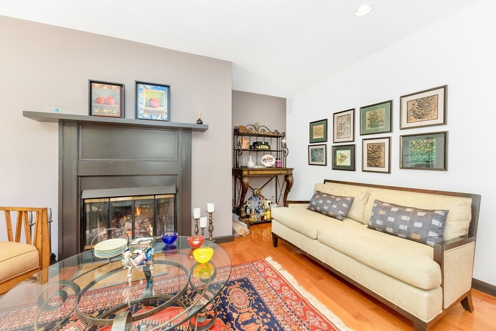 37 River Ridge Wellesley, MA 02481 - Photo 16 of 33 a living room with furniture or couch and a fireplace