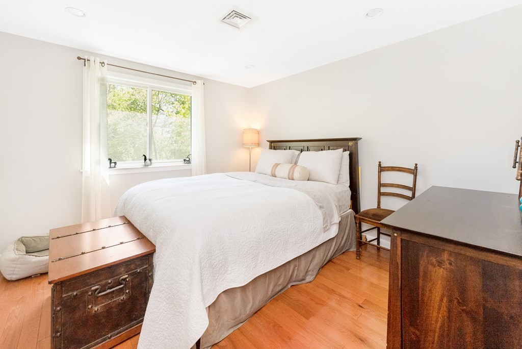 37 River Ridge Wellesley, MA 02481 - Photo 20 of 33 a bedroom with a bed and a window