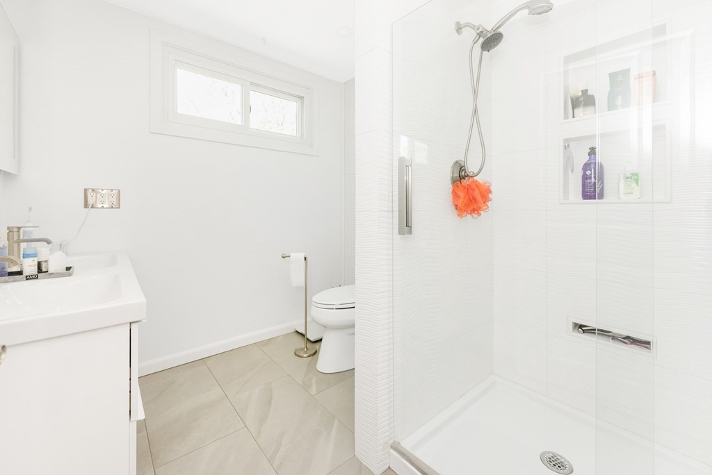 37 River Ridge Wellesley, MA 02481 - Photo 21 of 33 a bathroom with a sink toilet and vanity