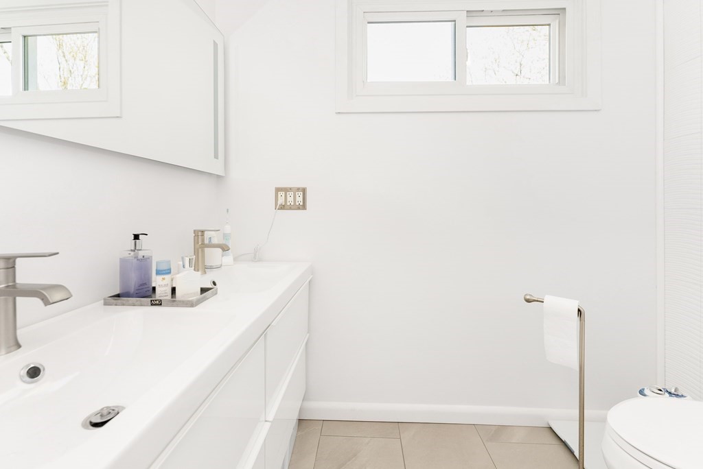 37 River Ridge Wellesley, MA 02481 - Photo 22 of 33 a bathroom with a sink and a toilet