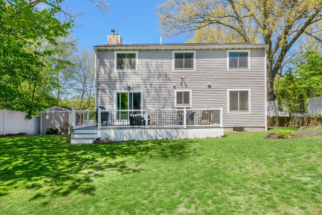 37 River Ridge Wellesley, MA 02481 - Photo 29 of 33 a view of a house with a backyard