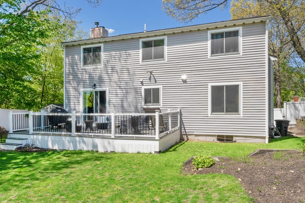 37 River Ridge Wellesley, MA 02481 - Photo 30 of 33 a front view of a house with a yard