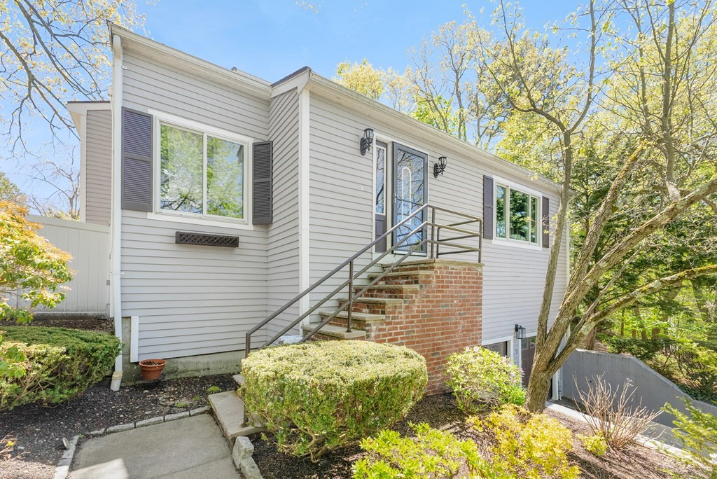 37 River Ridge Wellesley, MA 02481 - Photo 32 of 33 a view of a house with a yard