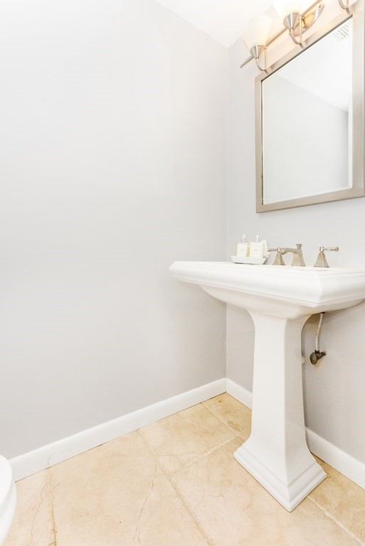 37 River Ridge Wellesley, MA 02481 - Photo 8 of 33 a bathroom with a sink and a mirror