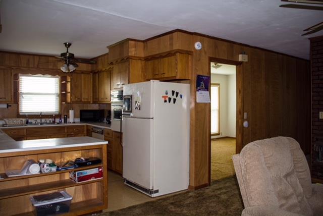 1143 Rabbit Trail Road Five Points, TN 38457 - Photo 13 of 13 a kitchen with refrigerator and window